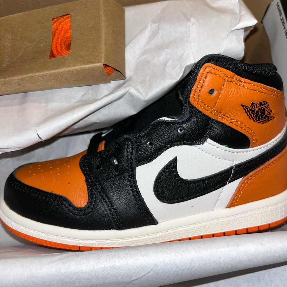 Jordan Kids Black, Orange, and White Sneakers